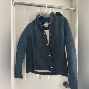Navy quilted jacket with detachable hood. Size medium.